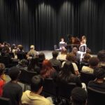 audience view of Booker High School students watching concert performed by Polish Chamber Musicians' Association