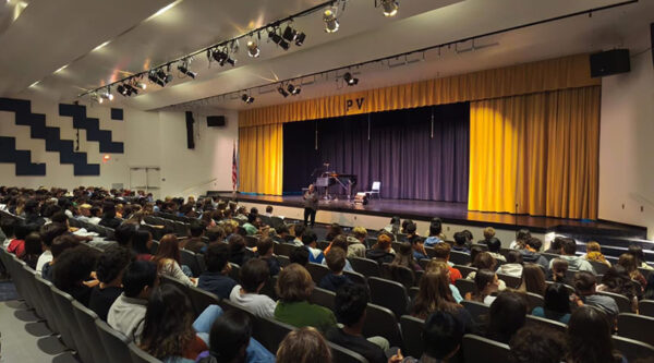 audience view of students watching performance concert performed by Polish Chamber Musicians' Association
